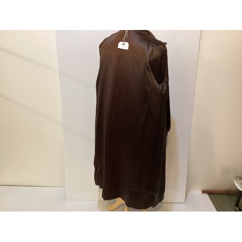 97 - A 3/4 length brown fur coat, condition: slight wear to fur at pockets and marks to hem lining.