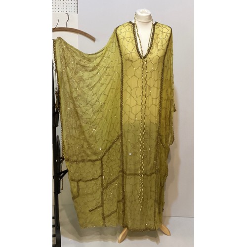 107 - THEO PORTER 1970's yellow kaftan dress with all over beading and tie belt, labelled Theo Porter Cout... 