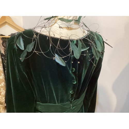 111 - ULRICH ENGLER green velvet long dress with silk pleated band to waist and feather and bead trim to c... 