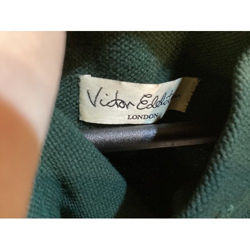 113 - VICTOR EDELSTEIN green dress with peplum, toggle fastening at collar and cuffs. OSCAR DE LA RENTA bl... 