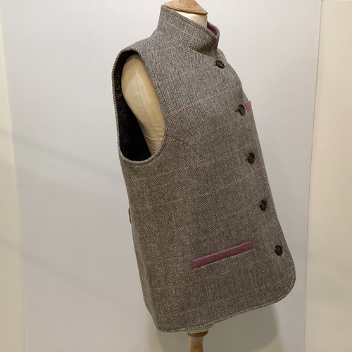 123 - Peter James,  Harris Tweed gilet with Nero collar and purple trim to collar, pockets, 100% wool made... 