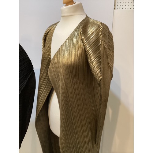 153 - ISSEY MIYAKE a black pleated top, ISSEY MIYAKE PLEATS PLEASE gold long cardigan coat, MASHIAH pleate... 