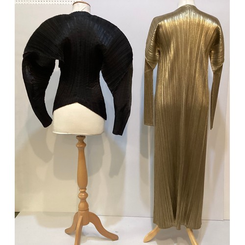 153 - ISSEY MIYAKE a black pleated top, ISSEY MIYAKE PLEATS PLEASE gold long cardigan coat, MASHIAH pleate... 