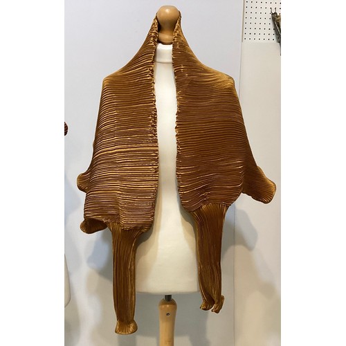 153 - ISSEY MIYAKE a black pleated top, ISSEY MIYAKE PLEATS PLEASE gold long cardigan coat, MASHIAH pleate... 