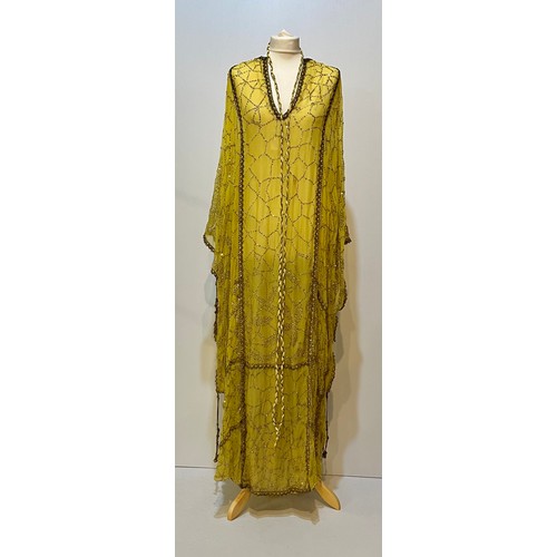 107 - THEO PORTER 1970's yellow kaftan dress with all over beading and tie belt, labelled Theo Porter Cout... 