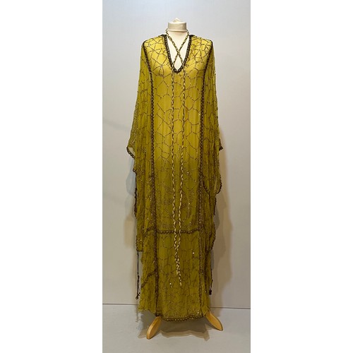 107 - THEO PORTER 1970's yellow kaftan dress with all over beading and tie belt, labelled Theo Porter Cout... 