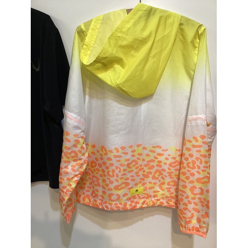 158 - STELLA McCARTNEY FOR ADIDAS shower proof jacket with hood. Size M. A pair of ROBERTO CAVALLI gym leg... 