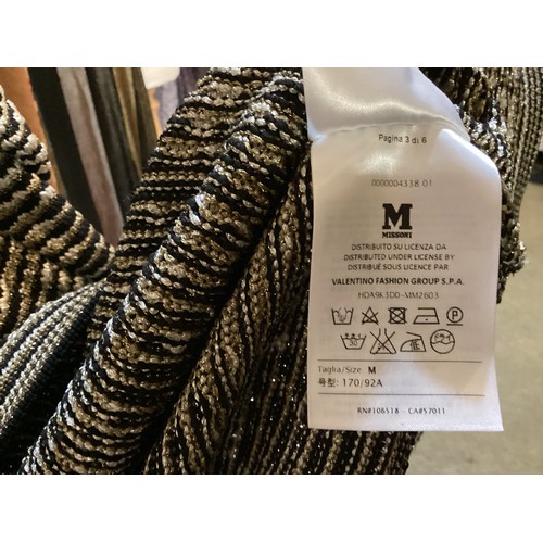 162 - A quantity of clothes to include MISSONI MARE knitted long skirt, DONNA KAREN long cashmere pencil s... 