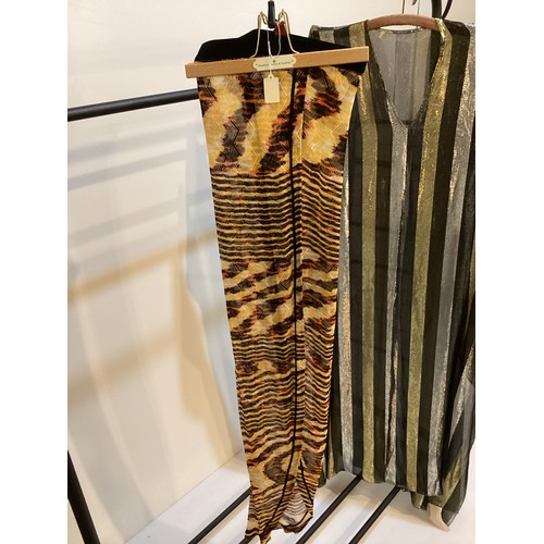 162 - A quantity of clothes to include MISSONI MARE knitted long skirt, DONNA KAREN long cashmere pencil s... 