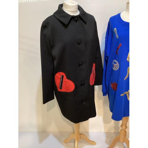 163 - LOVE MOSCHINO a black coat Jacquard fabric with Eco friendly leather love heart zipped pockets, a se... 