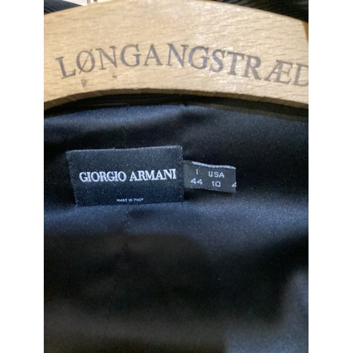 165 - A quantity of designer clothes and other items to include GIORGIO ARMANI, EMPORIO ARMANI, WSL, ETRO,... 