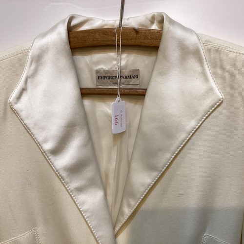 166 - EMPORIO ARMANI cream cotton and silk jacket with silver popper fastening (marks to front), a MSGM fa... 