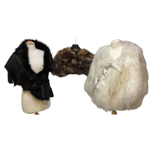 171 - A goat hair style cream wrap cape, EMPORIO ARMANI short fur stole, KARL DONOGHUE black leather and f... 