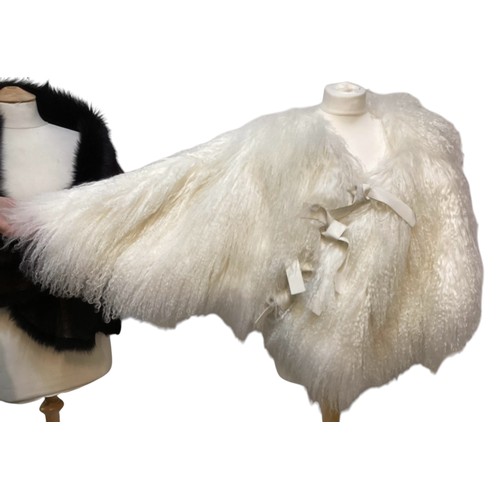 171 - A goat hair style cream wrap cape, EMPORIO ARMANI short fur stole, KARL DONOGHUE black leather and f... 