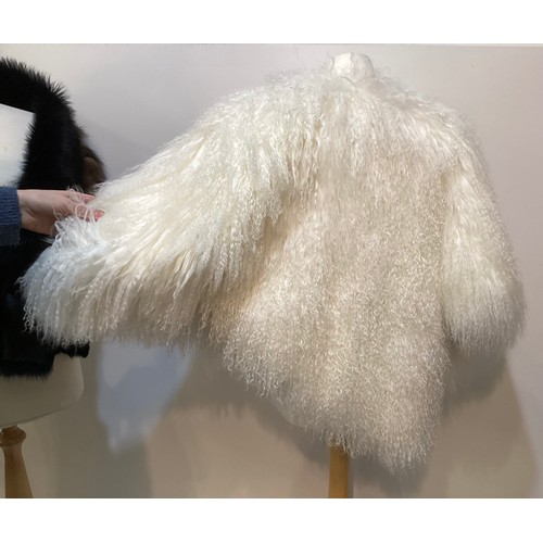 171 - A goat hair style cream wrap cape, EMPORIO ARMANI short fur stole, KARL DONOGHUE black leather and f... 