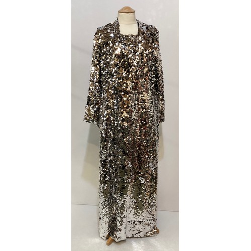 173 - A silver sequin long coat, no label.