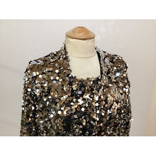 173 - A silver sequin long coat, no label.