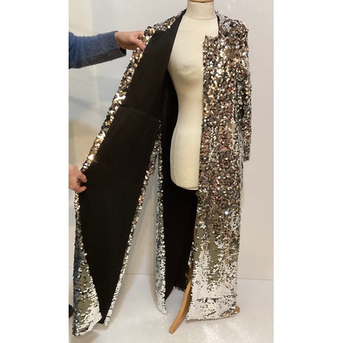 173 - A silver sequin long coat, no label.