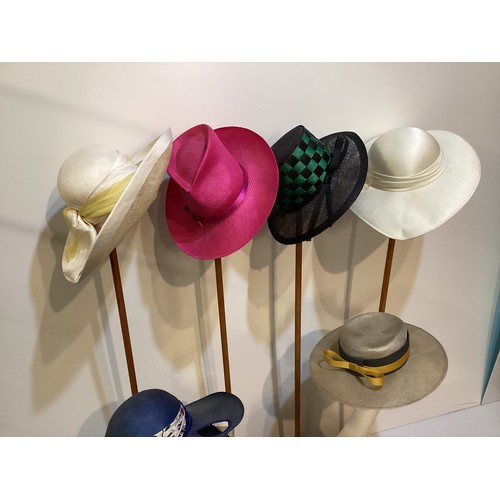 126 - A quantity of hats, styles from 1960's to 2000, straws and fabric, berets - to include John Boyd, Ph... 