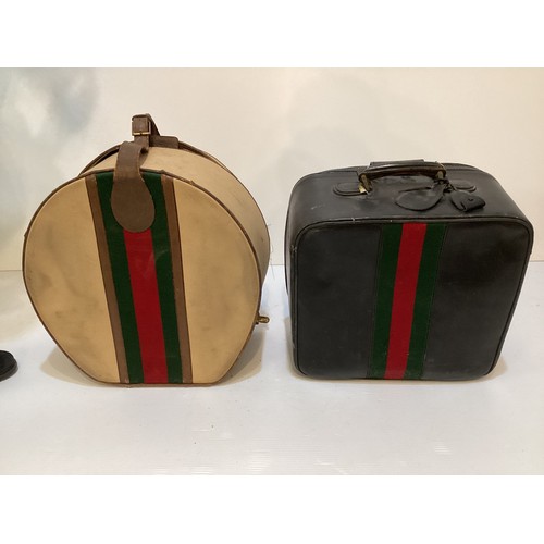 72 - Two pieces of Gucci luggage: a small black suitcase, stamped PEW, initials to handle, with iconic gr... 