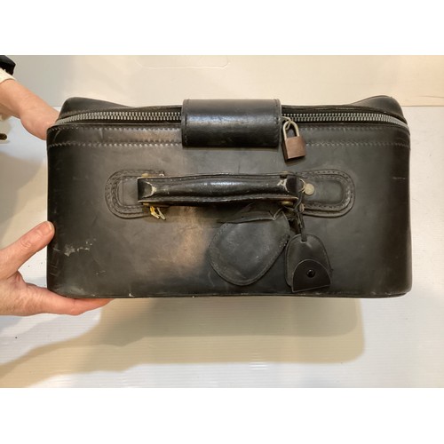 72 - Two pieces of Gucci luggage: a small black suitcase, stamped PEW, initials to handle, with iconic gr... 