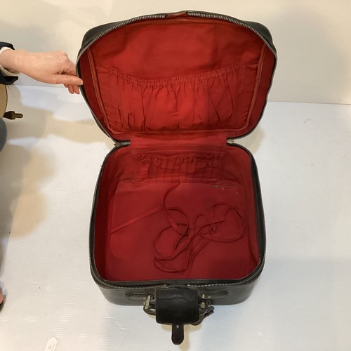 72 - Two pieces of Gucci luggage: a small black suitcase, stamped PEW, initials to handle, with iconic gr... 