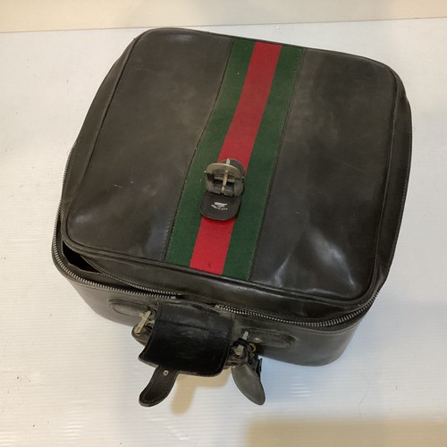 72 - Two pieces of Gucci luggage: a small black suitcase, stamped PEW, initials to handle, with iconic gr... 