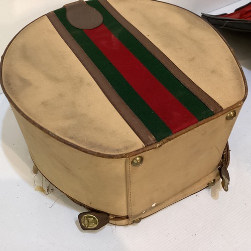 72 - Two pieces of Gucci luggage: a small black suitcase, stamped PEW, initials to handle, with iconic gr... 