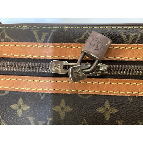 73 - LOUIS VUITTON 'STRATOS' SUITCASE, canvas and leather, brass hardware, in used condition with wear an... 