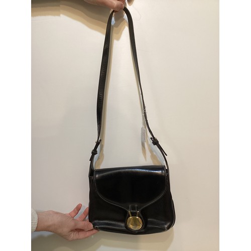 70 - A quantity of early GUCCI handbags and purses, in brown and black leather, some with wear, see all p... 