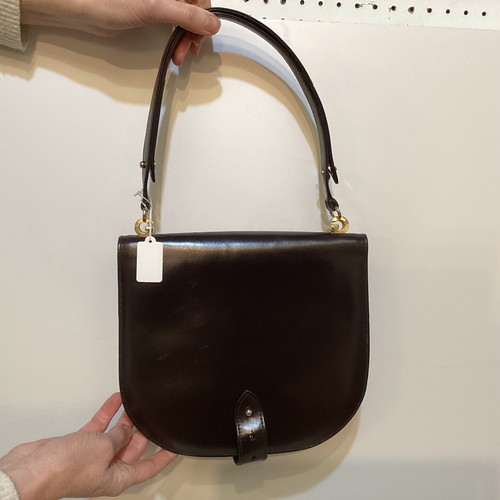 70 - A quantity of early GUCCI handbags and purses, in brown and black leather, some with wear, see all p... 