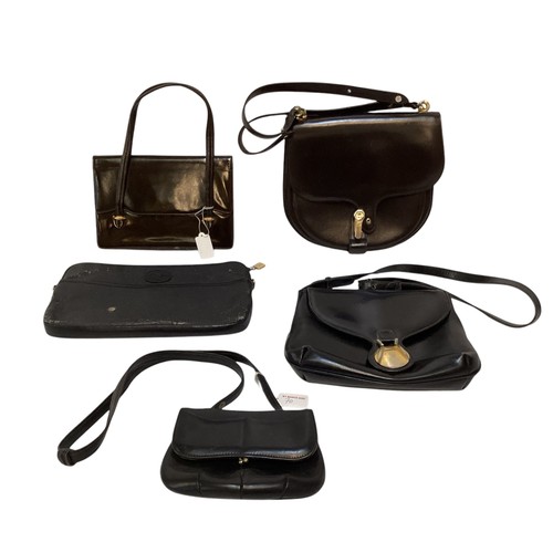 70 - A quantity of early GUCCI handbags and purses, in brown and black leather, some with wear, see all p... 