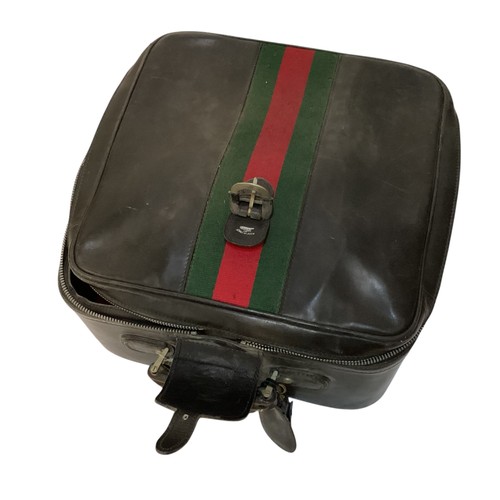 72 - Two pieces of Gucci luggage: a small black suitcase, stamped PEW, initials to handle, with iconic gr... 