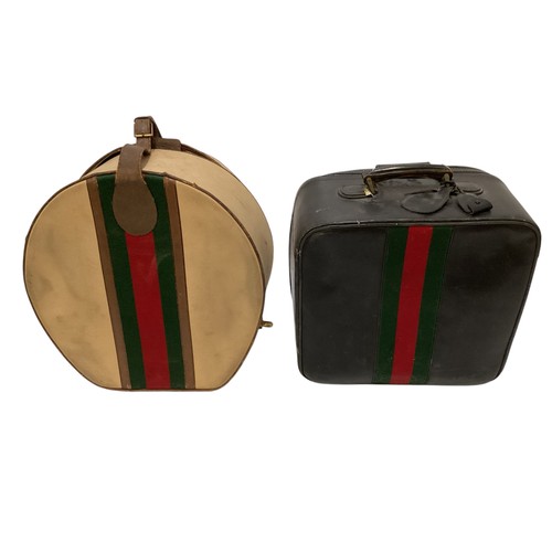 72 - Two pieces of Gucci luggage: a small black suitcase, stamped PEW, initials to handle, with iconic gr... 