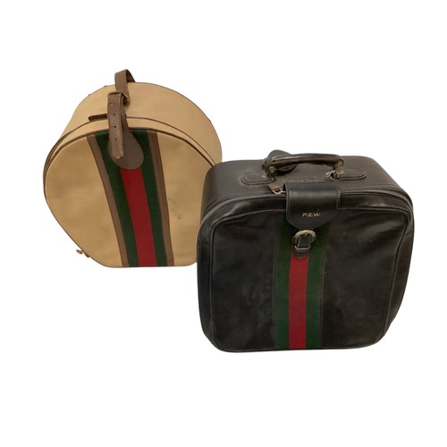 72 - Two pieces of Gucci luggage: a small black suitcase, stamped PEW, initials to handle, with iconic gr... 