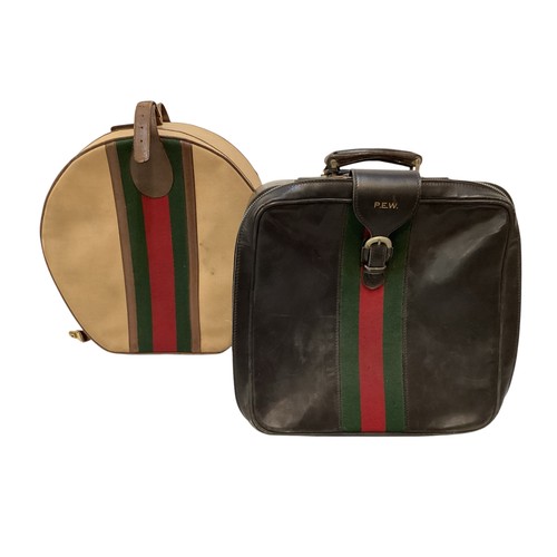 72 - Two pieces of Gucci luggage: a small black suitcase, stamped PEW, initials to handle, with iconic gr... 