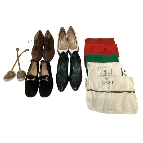 67 - Three pairs of GUCCI shoes, and one pair of Gucci ankle boots.  Marked various 36-37. Gucci shoe hor... 