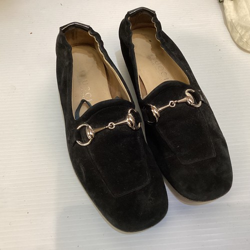 67 - Three pairs of GUCCI shoes, and one pair of Gucci ankle boots.  Marked various 36-37. Gucci shoe hor... 