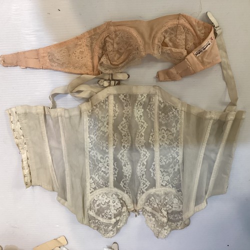 62 - A quantity of vintage undergarments - girdles and corsets,  some still with labels and tags, Mid C20... 