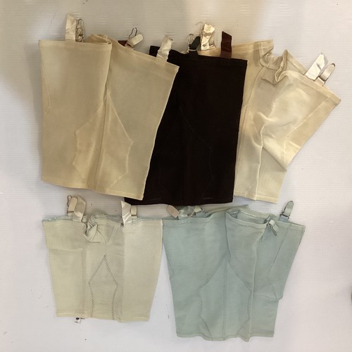 62 - A quantity of vintage undergarments - girdles and corsets,  some still with labels and tags, Mid C20... 