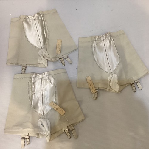 62 - A quantity of vintage undergarments - girdles and corsets,  some still with labels and tags, Mid C20... 