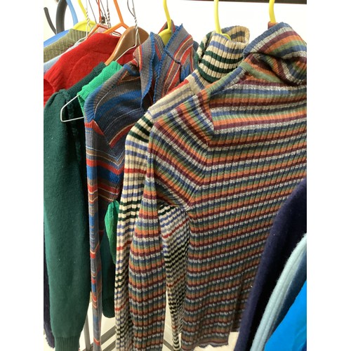 59 - A quantity of mixed style tops, cotton/wool/other condition worn some holes (14  items).