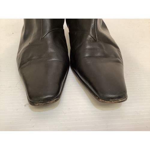 131 - Two pairs of HERMES leather ankle boots, one black, one brown (both with wear), pair of HERMES leath... 