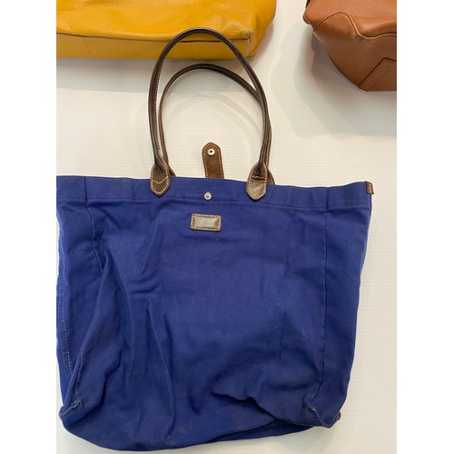 184 - Four leather handbags. Purple Jaeger in good condition, Osprey fold up canvas bag blue, two Paul Cos... 