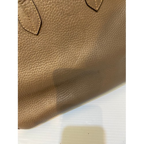 183 - Two leather handbags, TOD'S cream leather condition some marks, and another brown designer style.