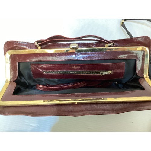 144 - A quantity of vintage handbags, including burgundy leather Loewe oversized purse, three further leat... 