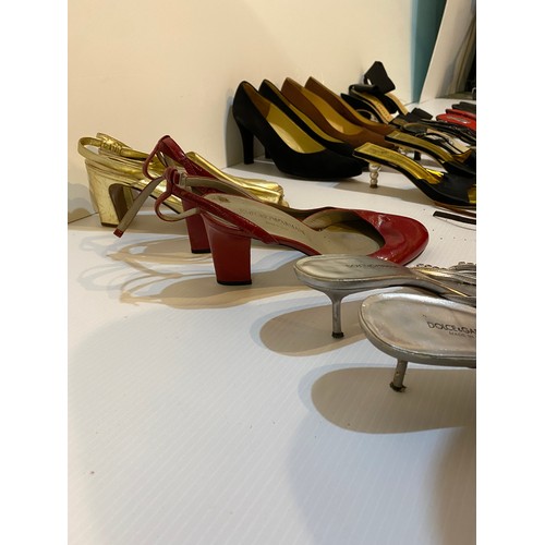 149 - A quantity of shoes, all in worn used condition, to include Miu Miu, Dolce & Gabbana, Donna Karen, F... 