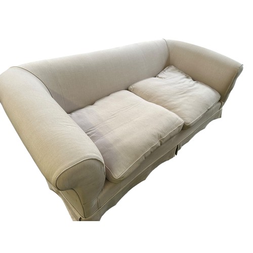 639 - A large cream sofa, approx 120cm deep x 236cm wide x74cm high