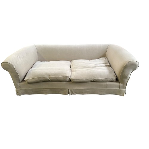 639 - A large cream sofa, approx 120cm deep x 236cm wide x74cm high