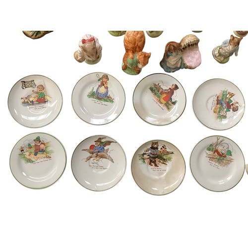 430 - A quantity of Beatrix Potter animal figures , with stamps to base, see all photos, and a Beswick phe... 